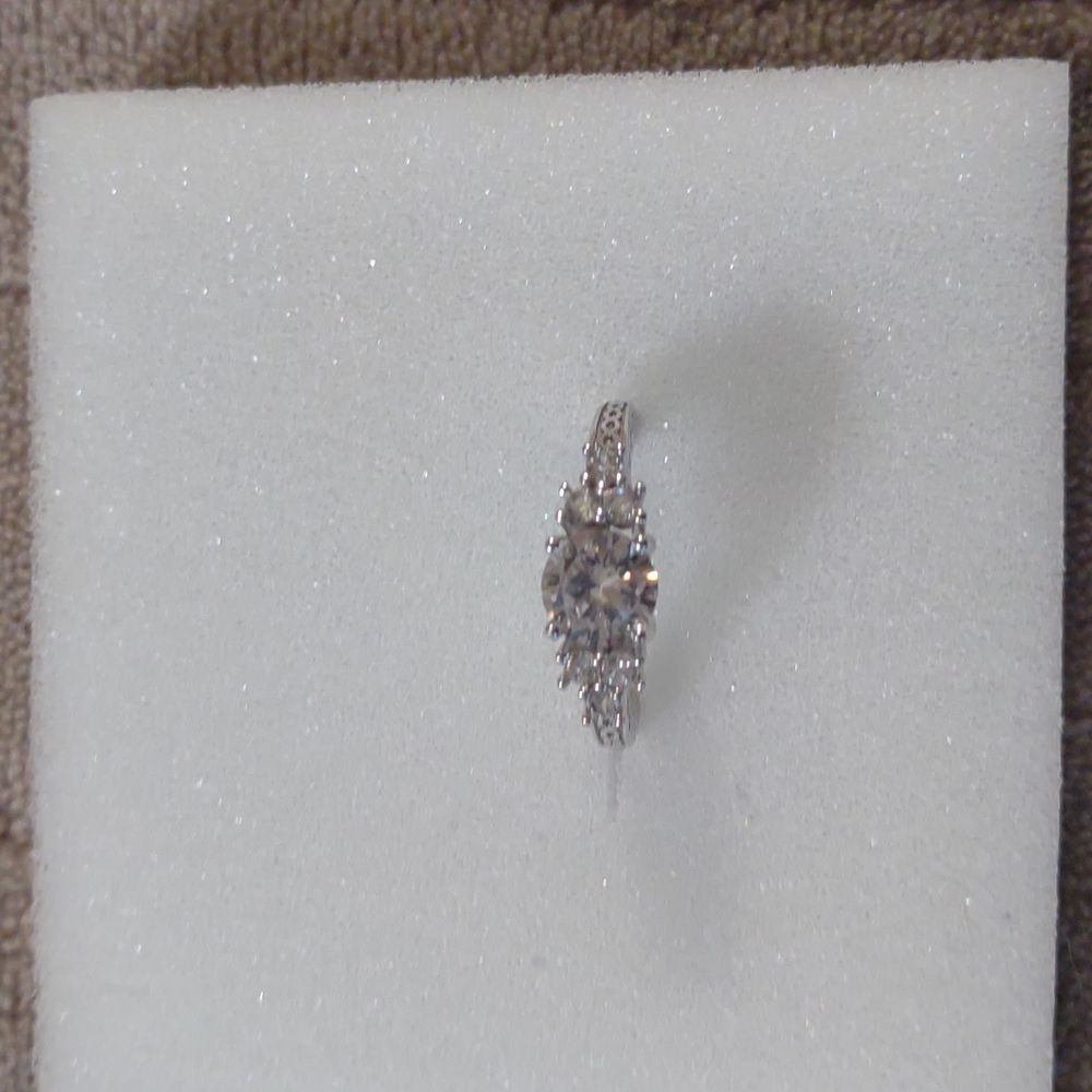 Sterling silver ring with artificial stones. Approx size 6. EUC No box. No tags.